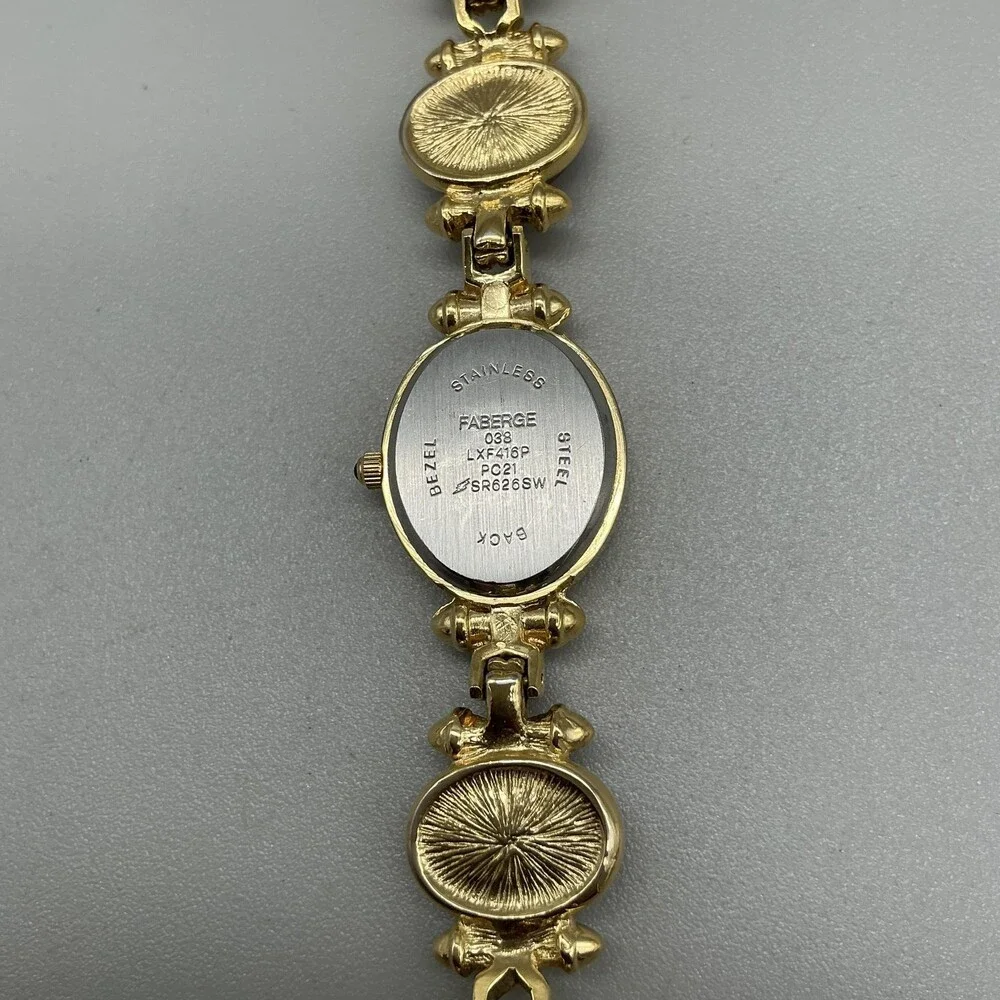 Faberge Scarab Womens Watch 19mm MOP Dial Gold Tone Multicolor New Battery 7.75